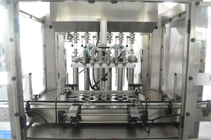 Industrial filling machine with multiple nozzles for efficient filling process