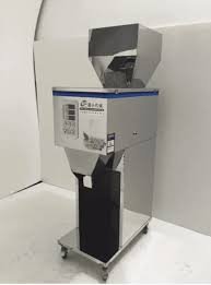 What is a Filling Machine role in granule packaging? An automated system utilizing a vibratory feeder to dispense precise weights of solid, free-flowing products.