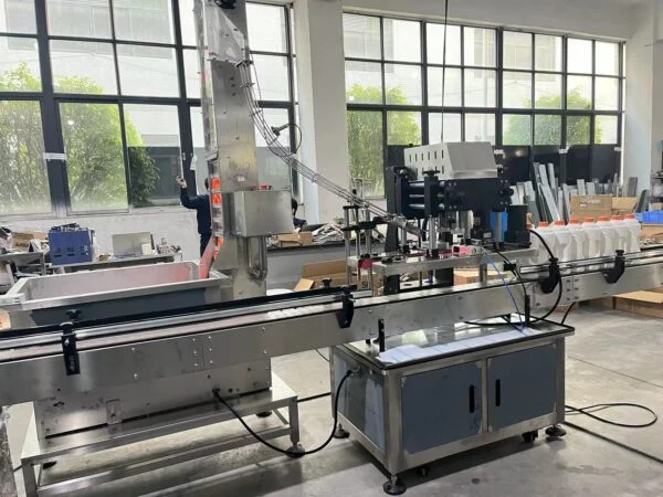 Automatic bottle filling line with stainless steel framework