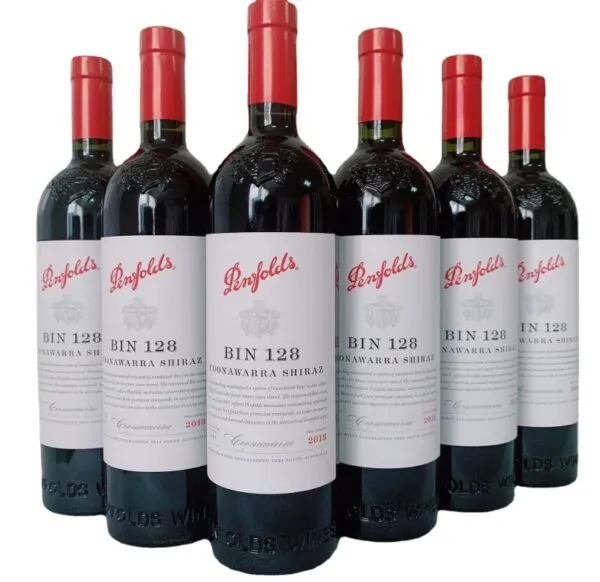 Wine bottles arranged for automated bottling process