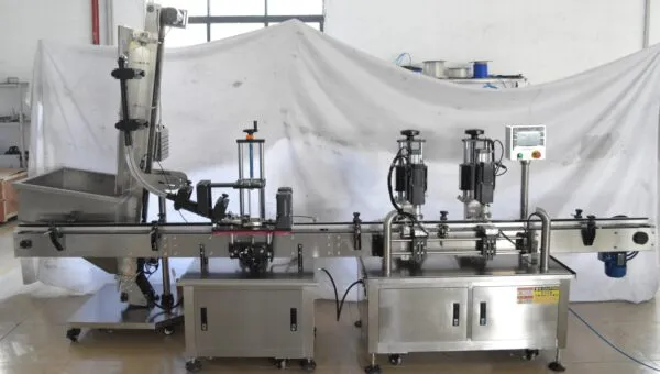 industrial filling and capping machine in factory environment