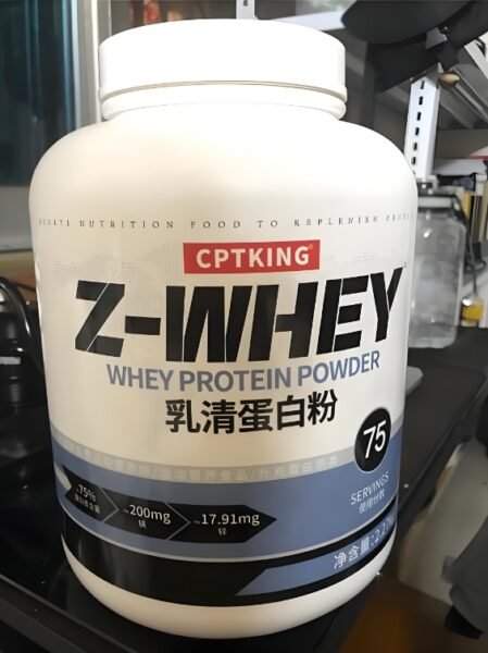 Whey protein powder container displayed for packaging process