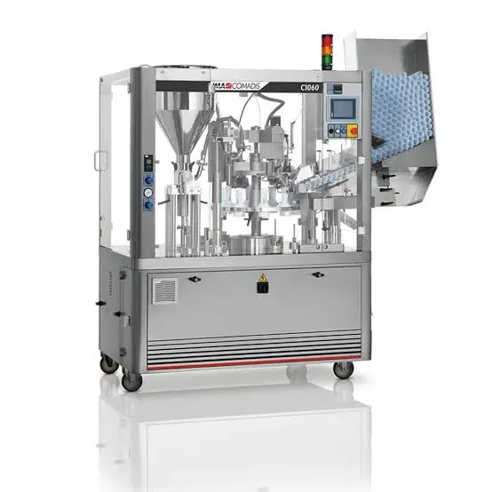 Fully automatic tube filling and sealing machine with enclosed filling stations for plastic and aluminum tube packaging production