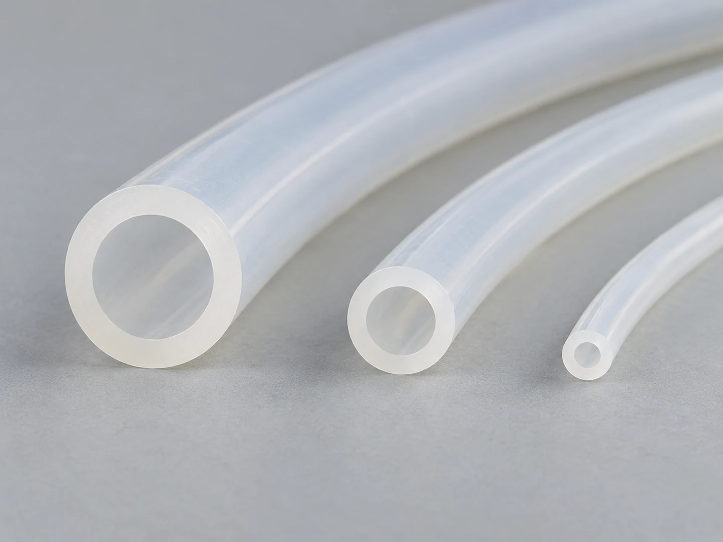 Peristaltic filling machine tubing shown in different bore sizes for liquid filling applications