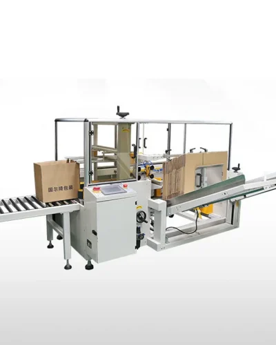 Carton Packaging Machine: Automated system packaging boxes on a conveyor belt.