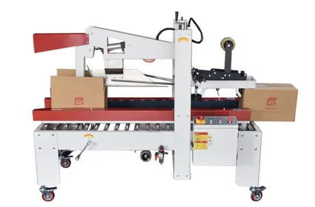 automatic carton packaging machines on a factory production line.