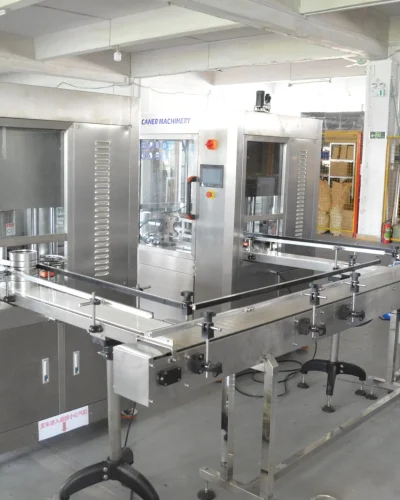Automated filling machine for packaging, likely used for milk powder filling, with conveyor system.