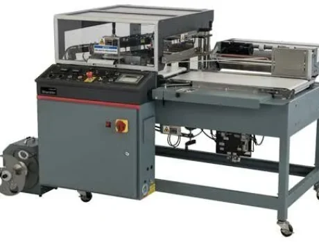 Industrial automatic packaging machine with conveyor system and control panel for product handling and sealing