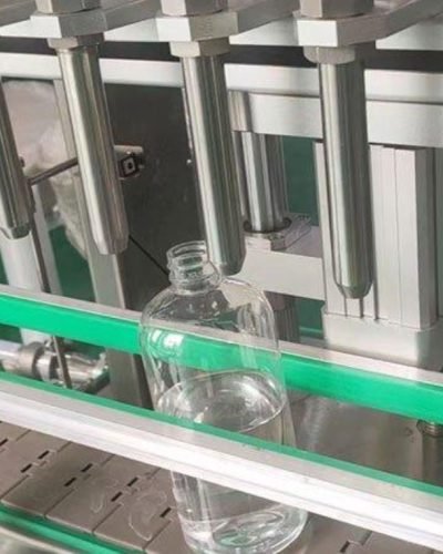 Stainless steel conveyor system connected to filling equipment