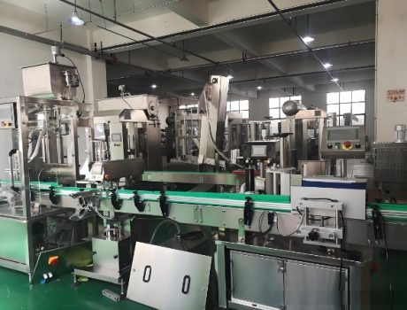 High-capacity beverage filling and capping machine