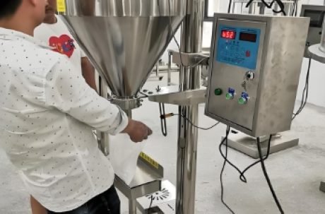 Multi-head powder filling line operating in industrial facility