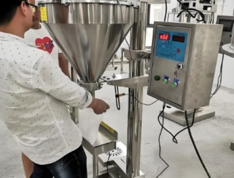 Multi-head powder filling line operating in industrial facility