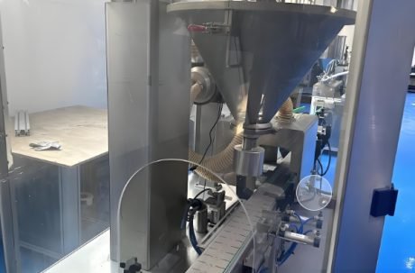 Auger filling system for powder and granular products