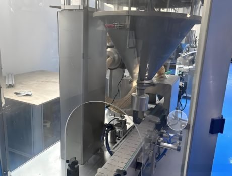 Auger filling system for powder and granular products