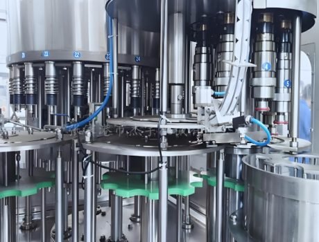 Multi-head liquid filling machine operating in beverage facility
