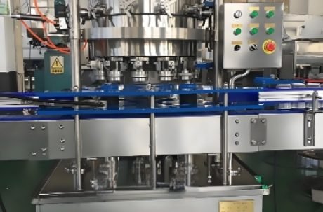 : Automated bottle filling and capping line with control panel
