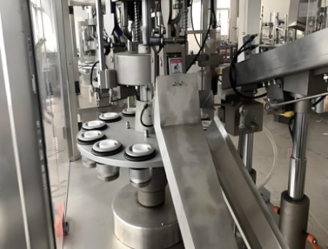 Automated cosmetic tube filling machine processing