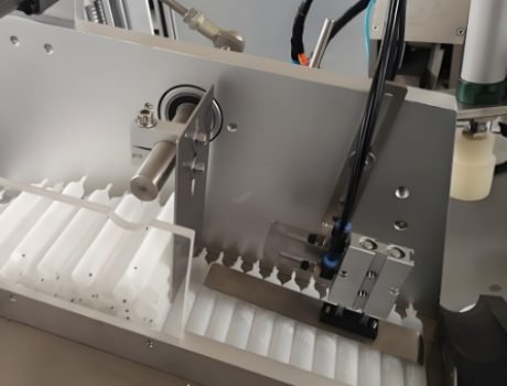 Empty cosmetic jars aligned for automated filling process