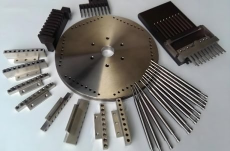 Various capsule molds and parts used for pharmaceutical production machines