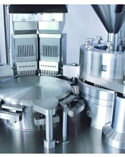 Close-up of pharmaceutical capsules being processed by automated machinery.