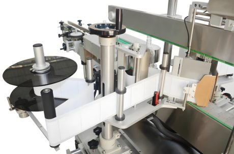 Automated labeling system for labeling and packaging containers in bulk.